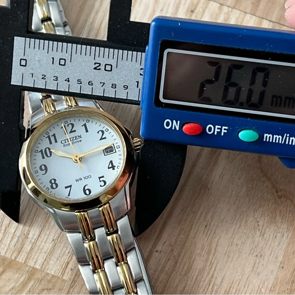 Citizen Eco-Drive Ladies Watch Two-Tone Bracelet White Dial Date Window